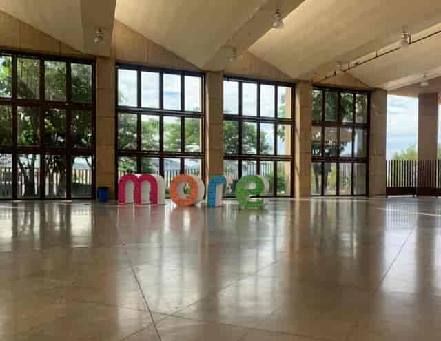 Event planner staging 3D branded lettering in WTC Morelos for corporate event and conference.