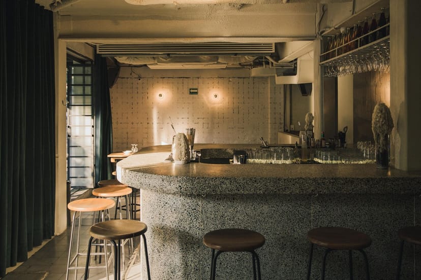 Modern Nivbar wine bar interior, elegant wood decor, hospitality venue and upscale event space.