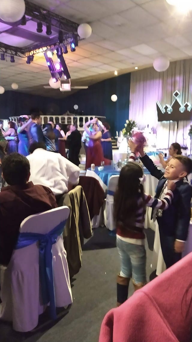 Ballroom event with tiered seating, perfect for gala and corporate party social production.
