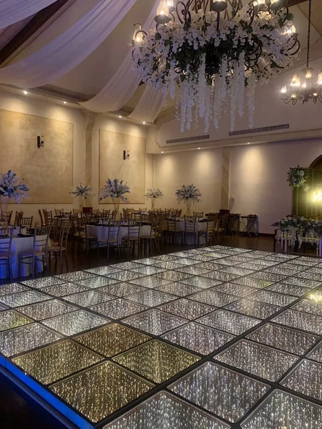Hacienda de San Nicolás wedding reception with LED dance floor for luxury events.