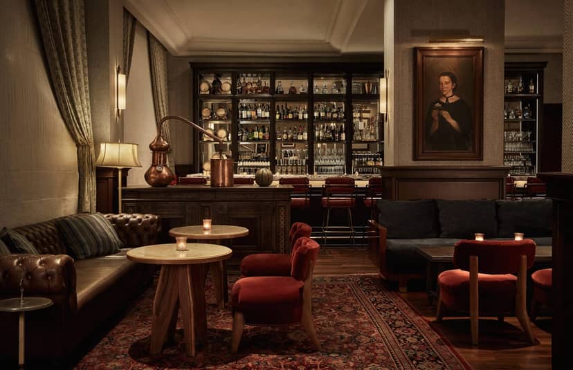 VIP cocktail lounge with plush velvet seating for upscale networking and private event receptions.