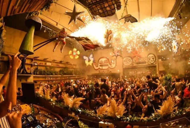 Immersive event venue in Rock L' Club with pyrotechnics for experiential corporate functions.