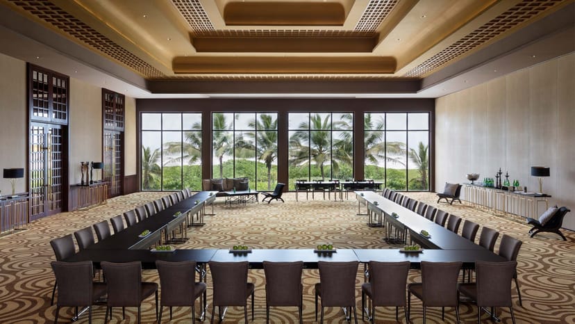 U-shape boardroom at Rock L' Club with floor-to-ceiling windows for executive retreats.