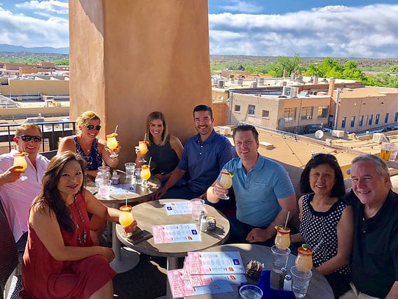 Rooftop networking reception at The Bell Tower Bar for corporate event and social mixer.