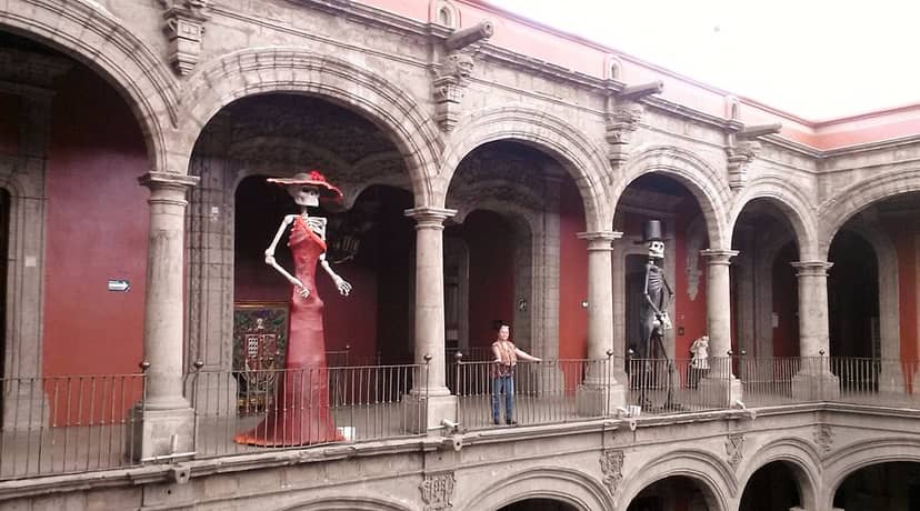 Historic museum with thematic installations for immersive cultural events and art exhibitions.