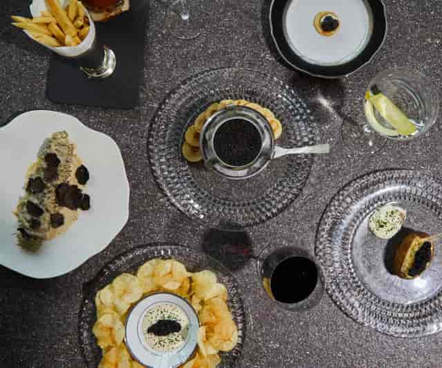 Luxury Caviar Bar VIP dining at Alexander Hotel for upscale corporate events and exclusive meetings.