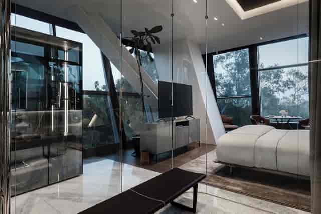 Luxury Alexander Hotel VIP suite with natural light for executive retreats and board meetings.