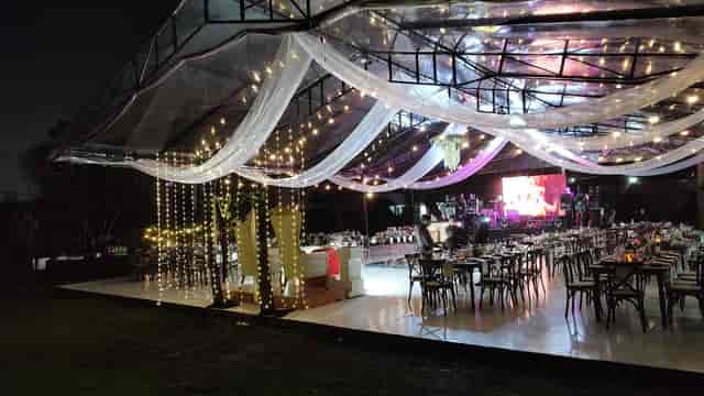Clear-top tent wedding reception at Hacienda la Esmeralda with fairy lights.