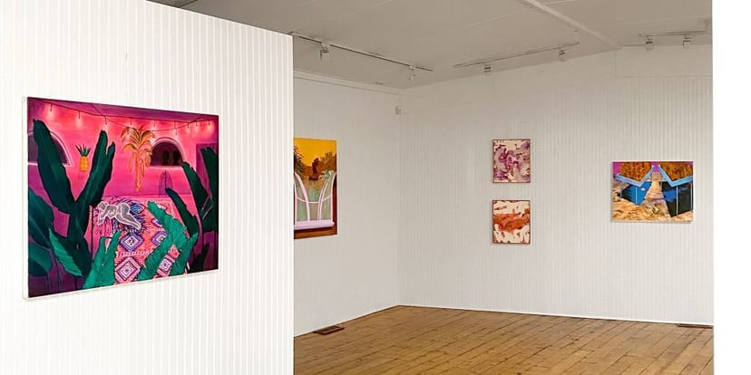Minimalist Casa Equis art gallery with track lighting for boutique receptions and networking events.
