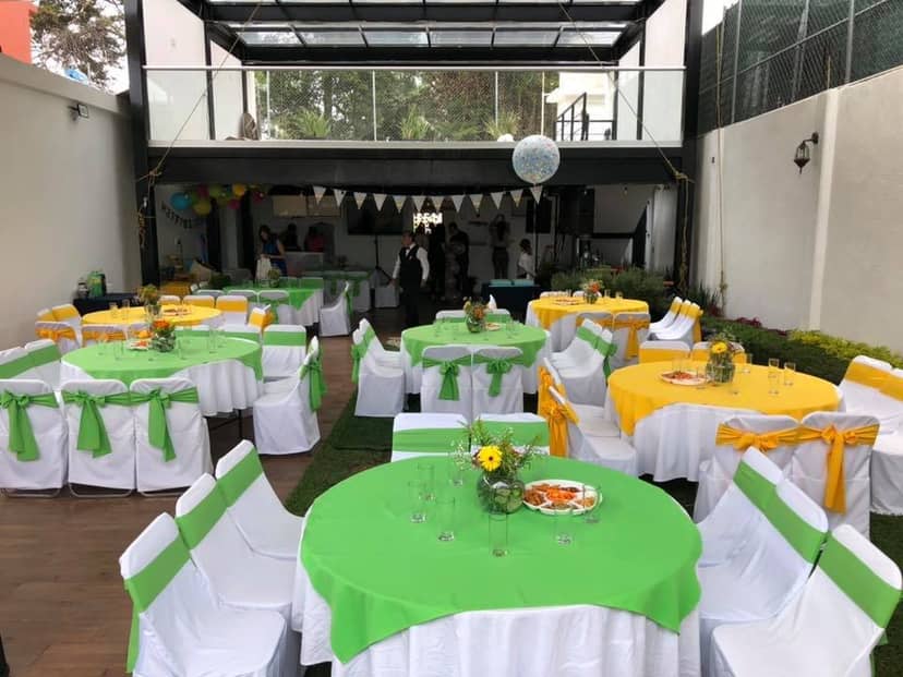 Terraza 53 outdoor banquet courtyard with colorful linens for wedding and corporate event venue.