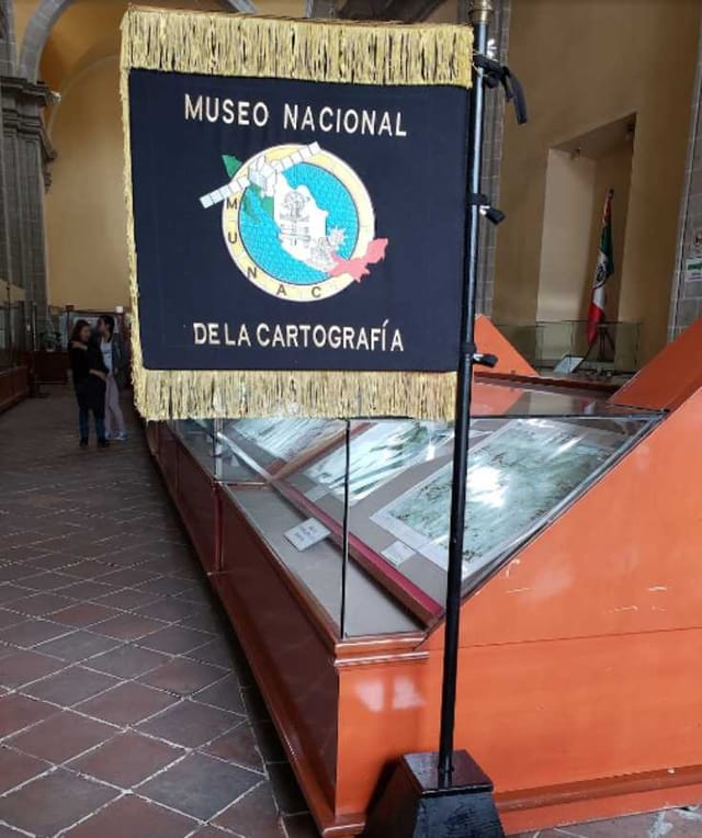 Museum exhibition hall with thematic signage, perfect for corporate events and trade shows.