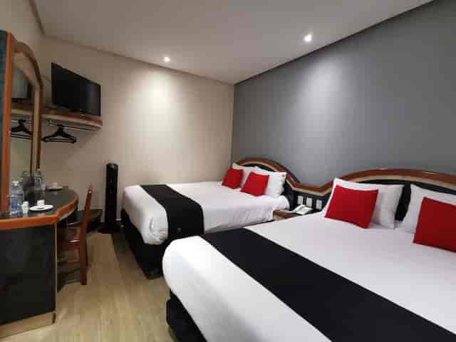 Budget double hotel room, compact layout for transit accommodation and short stays.