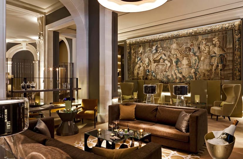 Upscale Café Beau-Rivage lounge for VIP receptions and corporate board meeting breakouts.