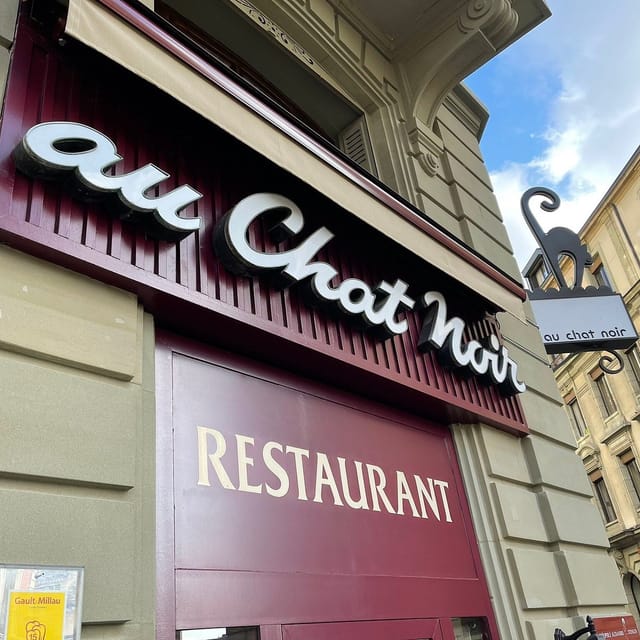 Au Chat Noir French restaurant facade, perfect for intimate off-site dinners and client receptions.