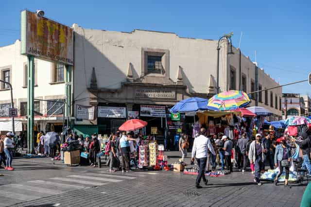 Plaza Central de Xochimilco square with pedestrian congestion for event planning and logistics.