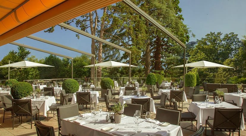 Luxury outdoor terrace at Hotel Royal Savoy Lausanne for corporate networking and elegant events.