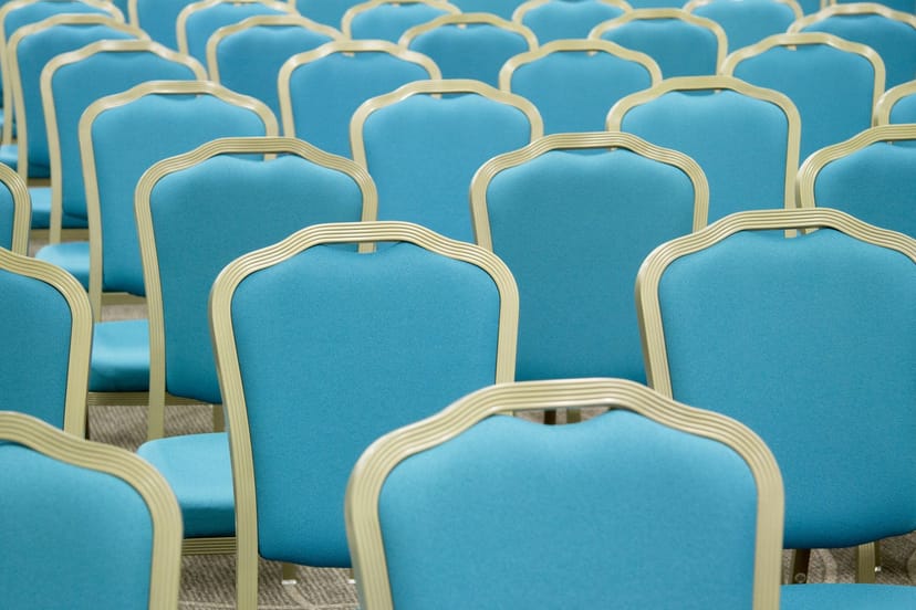 Theater-style auditorium at Aquatis Hotel for professional conferences and business events.