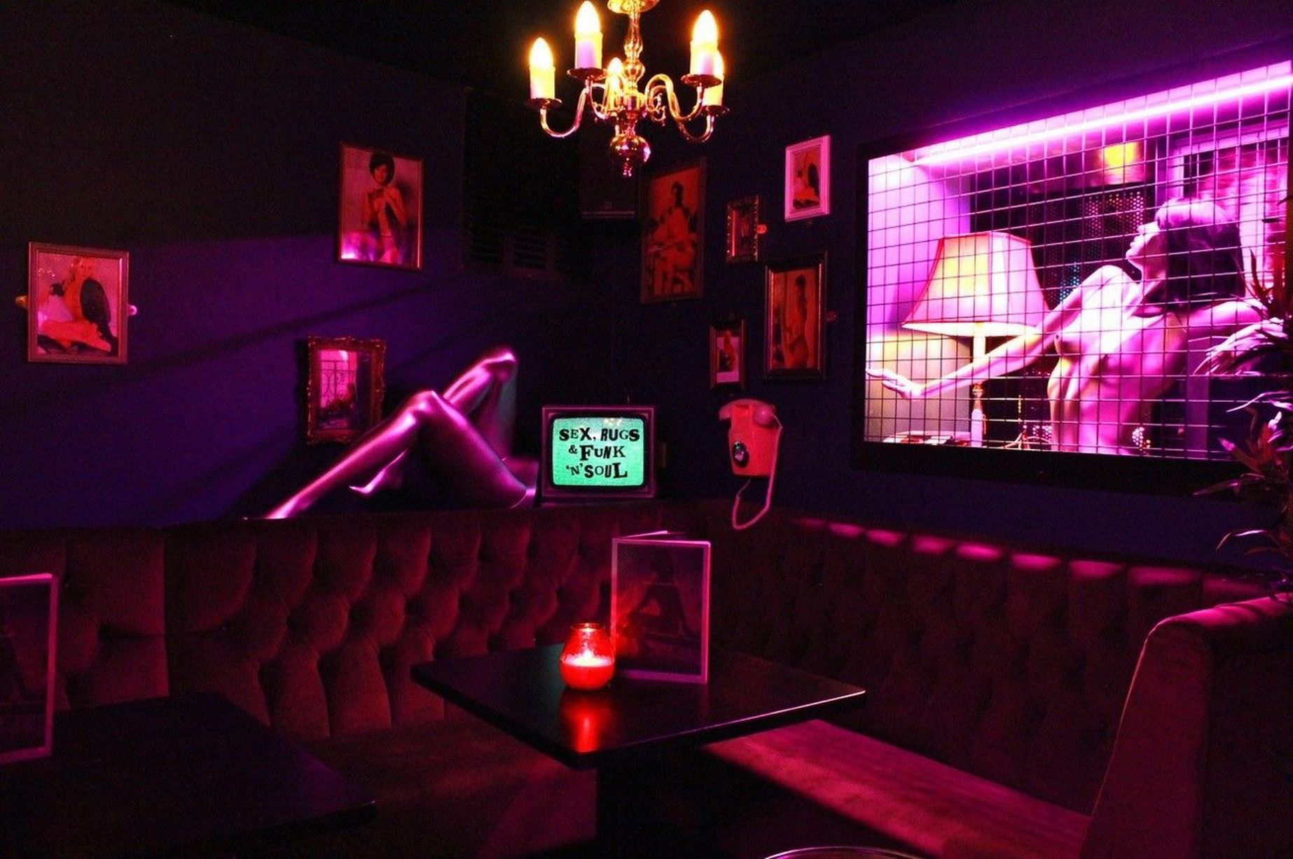 Neon-lit VIP lounge bar for exclusive after-party and influencer activation events.