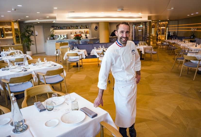 Upscale Brasserie dining room for corporate dinners and high-end networking events.