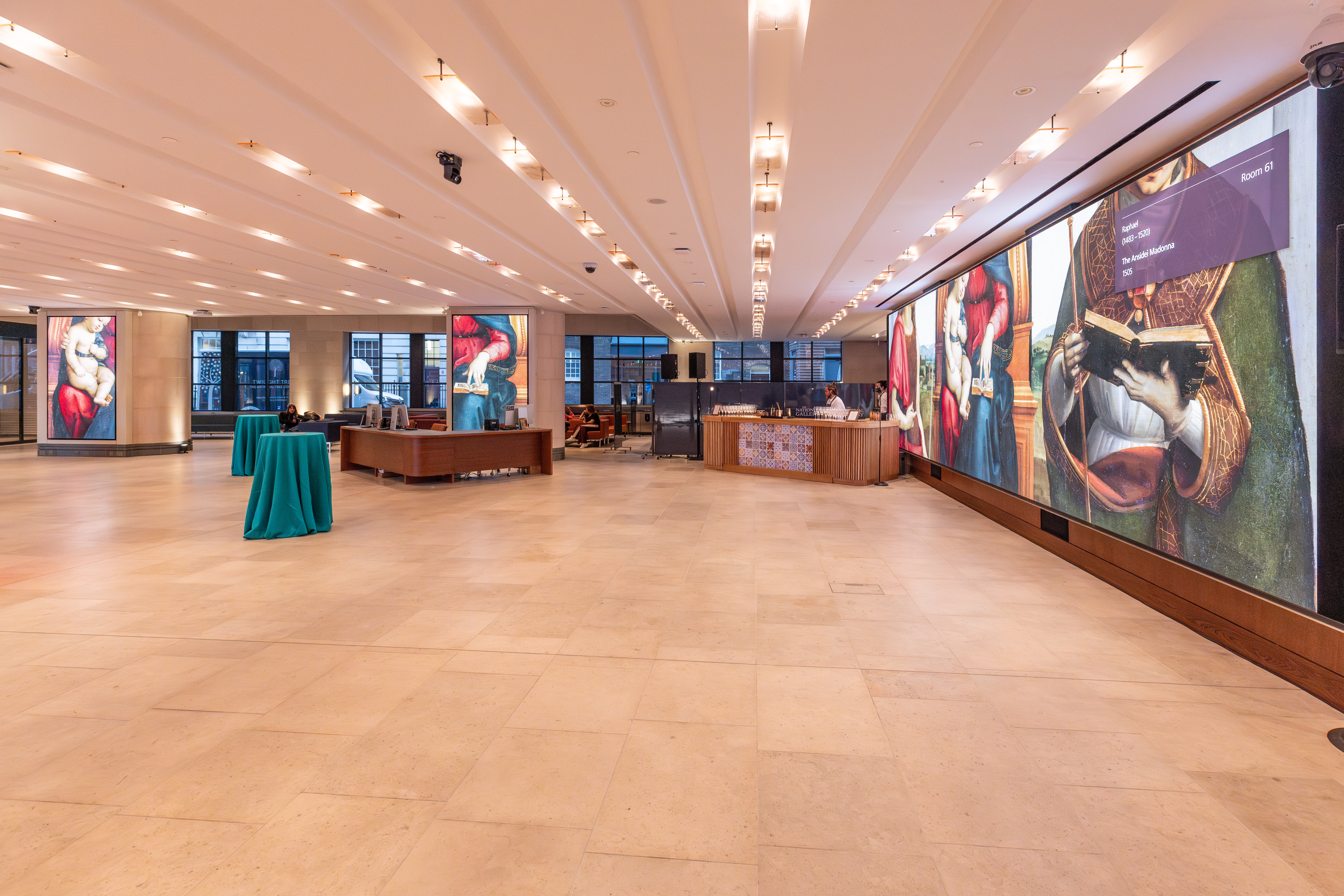 Sainsbury Wing Foyer event space with modern lighting for corporate gatherings and presentations. - Banner