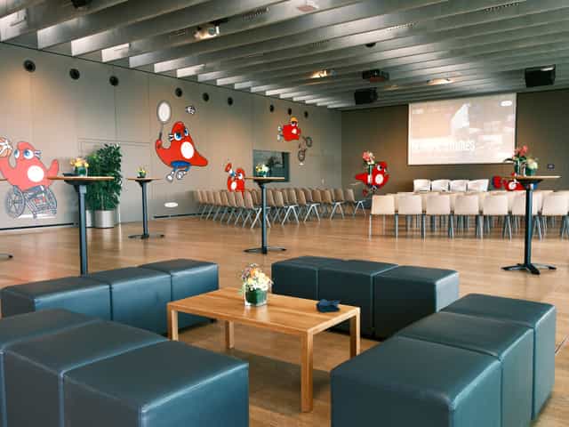 Lausanne Room at Olympic Museum: split-level event space for hybrid meetings and presentations.