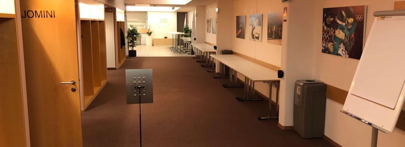 Centre Général Guisan foyer, registration desk setup for corporate event or conference venue.