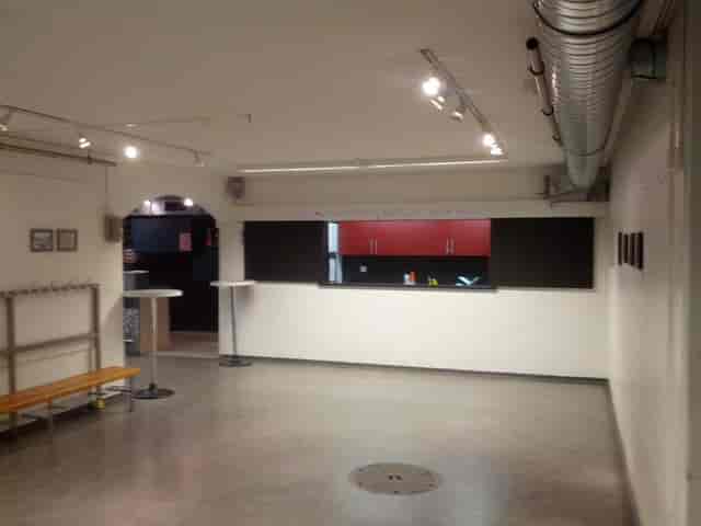Espace 44 industrial theatre venue with open HVAC, ideal for creative event and gala space rental.
