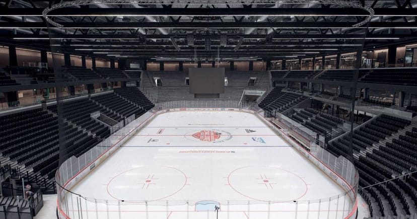 Vaudoise Aréna ice rink with tiered seating, ideal for corporate events and exhibition space.