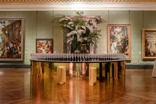 Wohl Room in National Gallery: Elegant event space for upscale receptions with floral decor.
