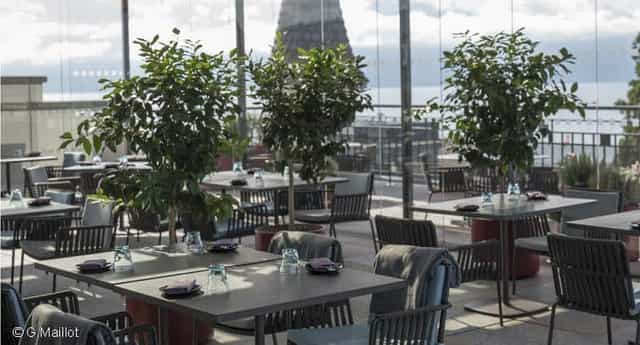 Modern open-air rooftop lounge for corporate cocktail receptions and upscale networking events.
