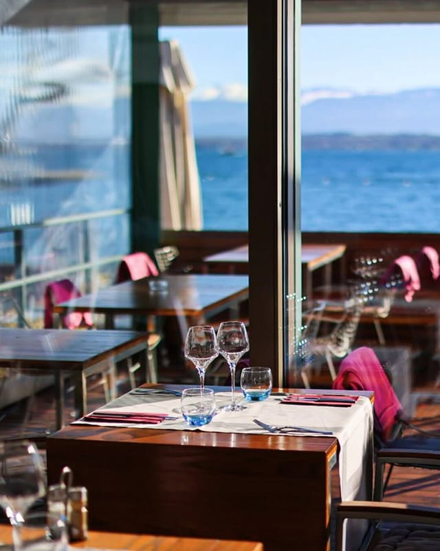 Waterfront dining at Ô Terrasse: scenic event venue with natural light for intimate dinners.