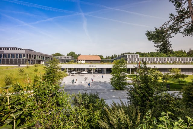 Modern EHL Innovation Hub campus for corporate retreats and academic conferences.
