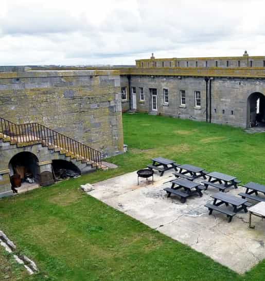 Thorne Island outdoor event venue with picnic seating for corporate gatherings and functions.