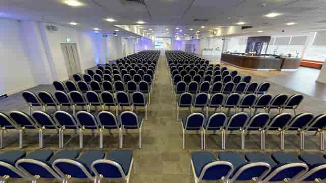 Theater-style conference room setup for corporate events and professional meetings.