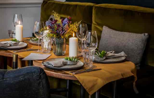 Elegant table setting at THE PILGRM for upscale events and intimate gatherings.