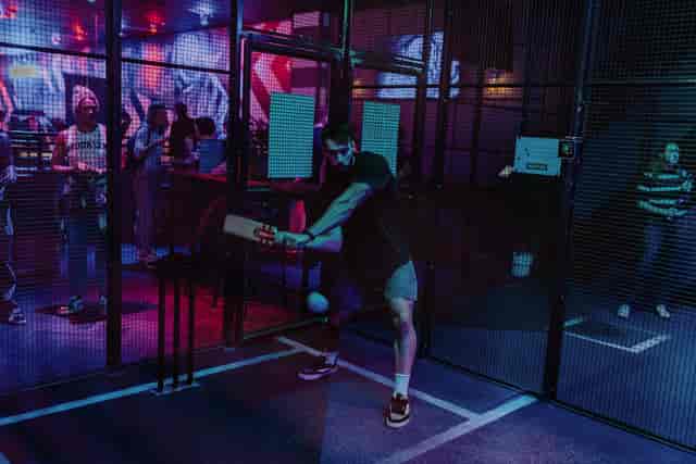 Interactive cricket simulation in Roxy Lanes, ideal for corporate team-building events.