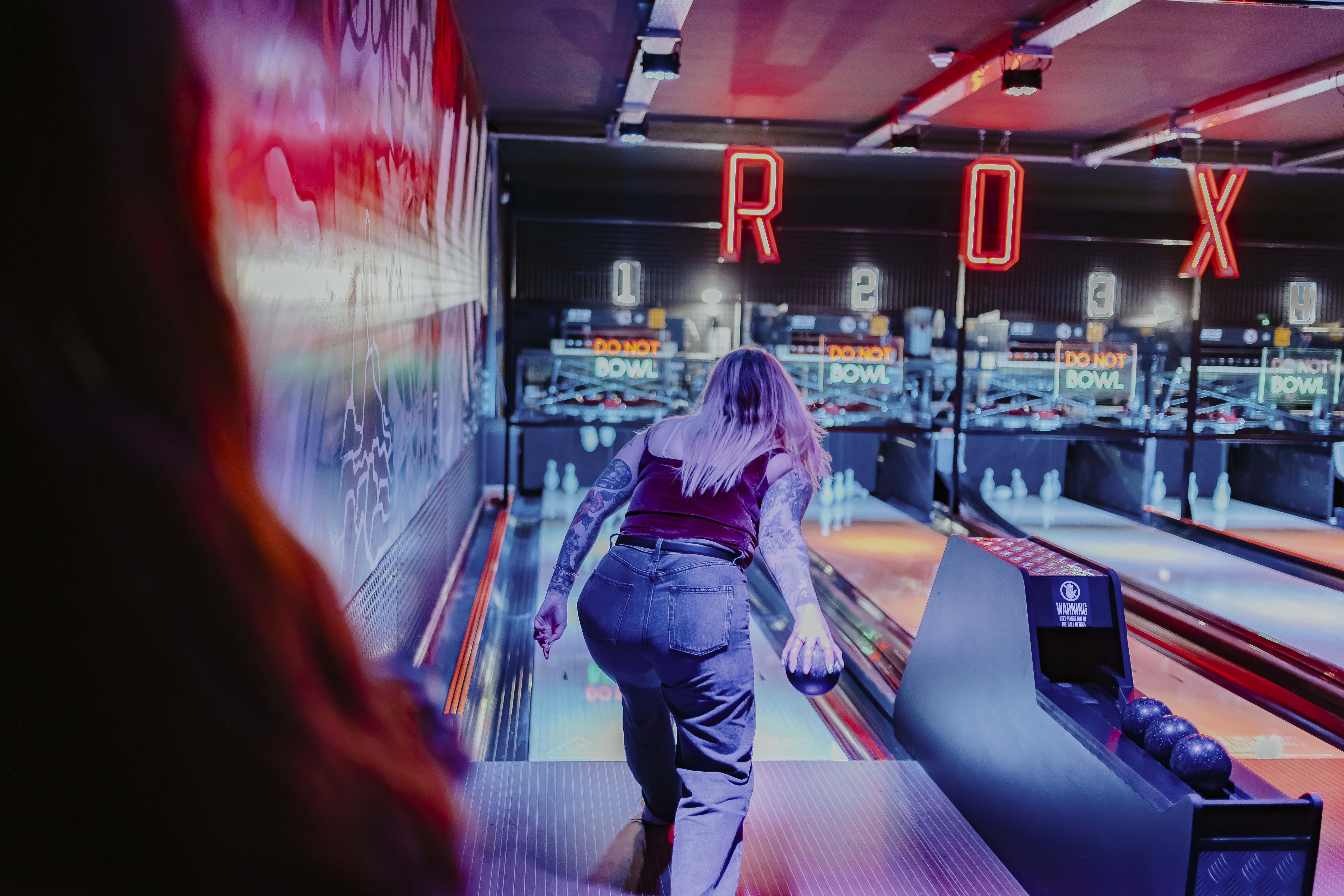 "Vibrant bowling alley at Roxy Ball Room, ideal for corporate events and team building." - Banner