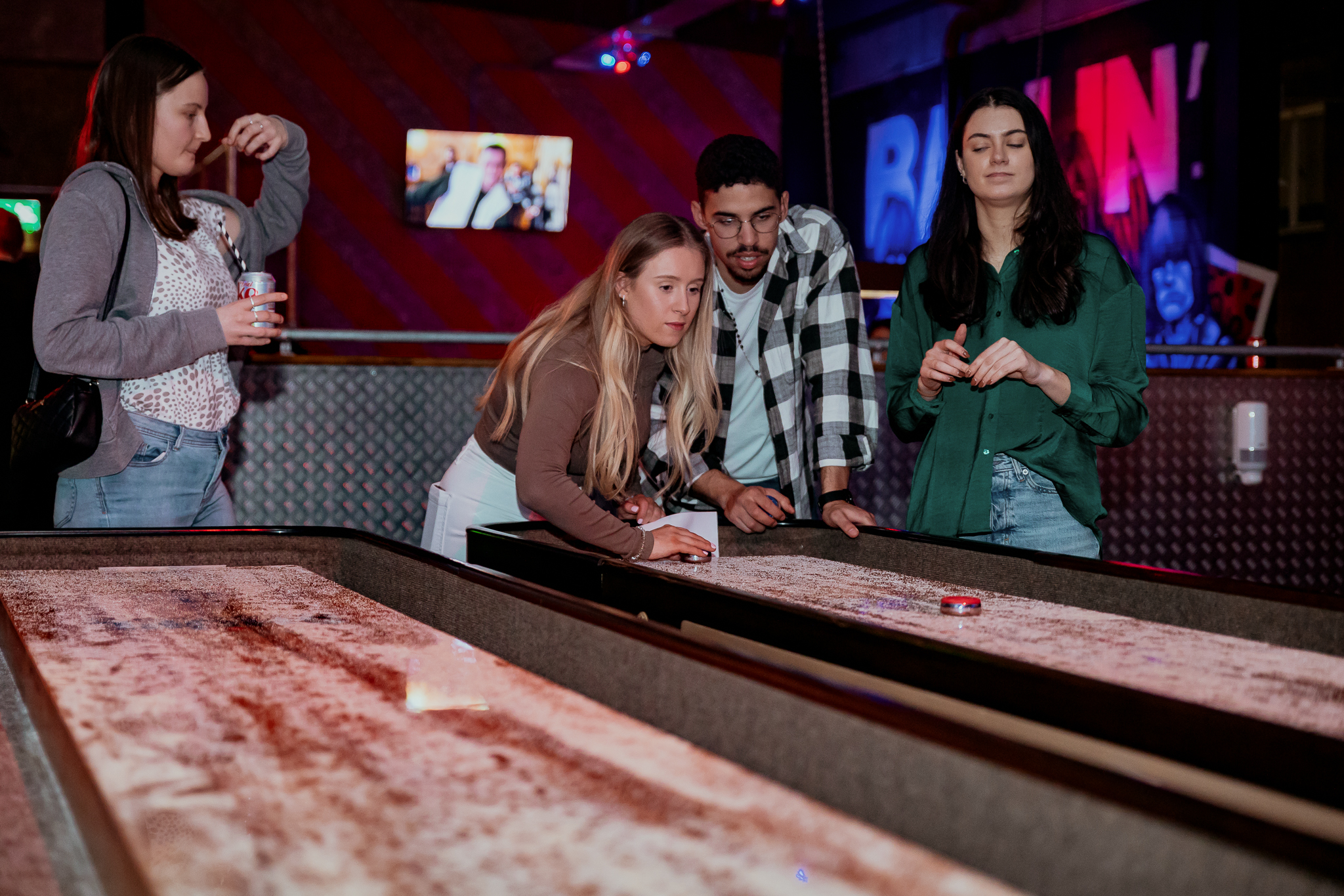 Shuffleboard game at Roxy Ball Room Liverpool, perfect for corporate retreats and team-building.