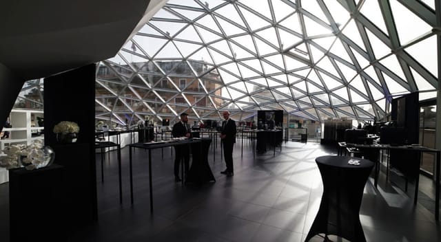 Modern event space in La Lanterna Rome with a glass dome, perfect for networking events.