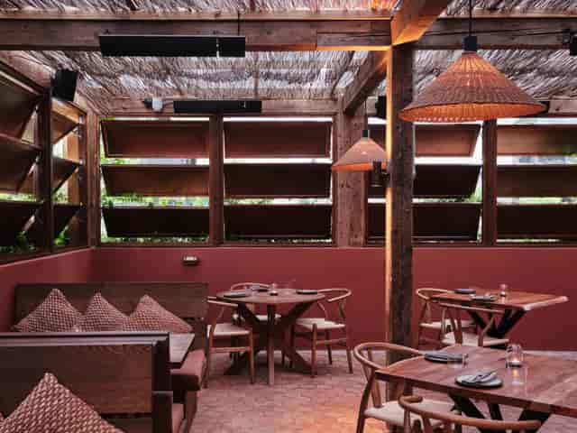 Cozy Pyro Full Venue dining space with natural materials for intimate gatherings.