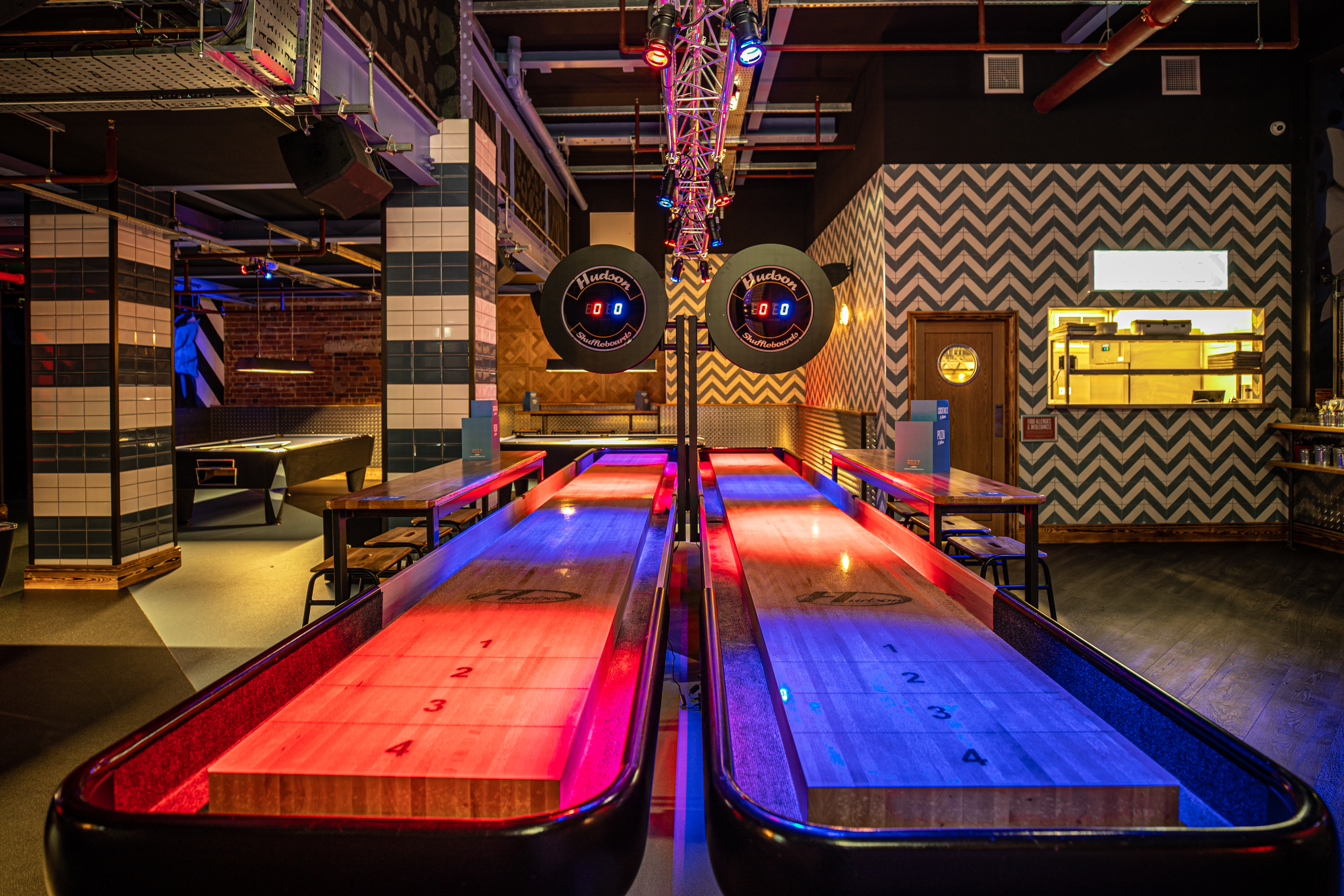Shuffleboard area at Roxy Lanes Leeds, perfect for corporate events and team-building.
