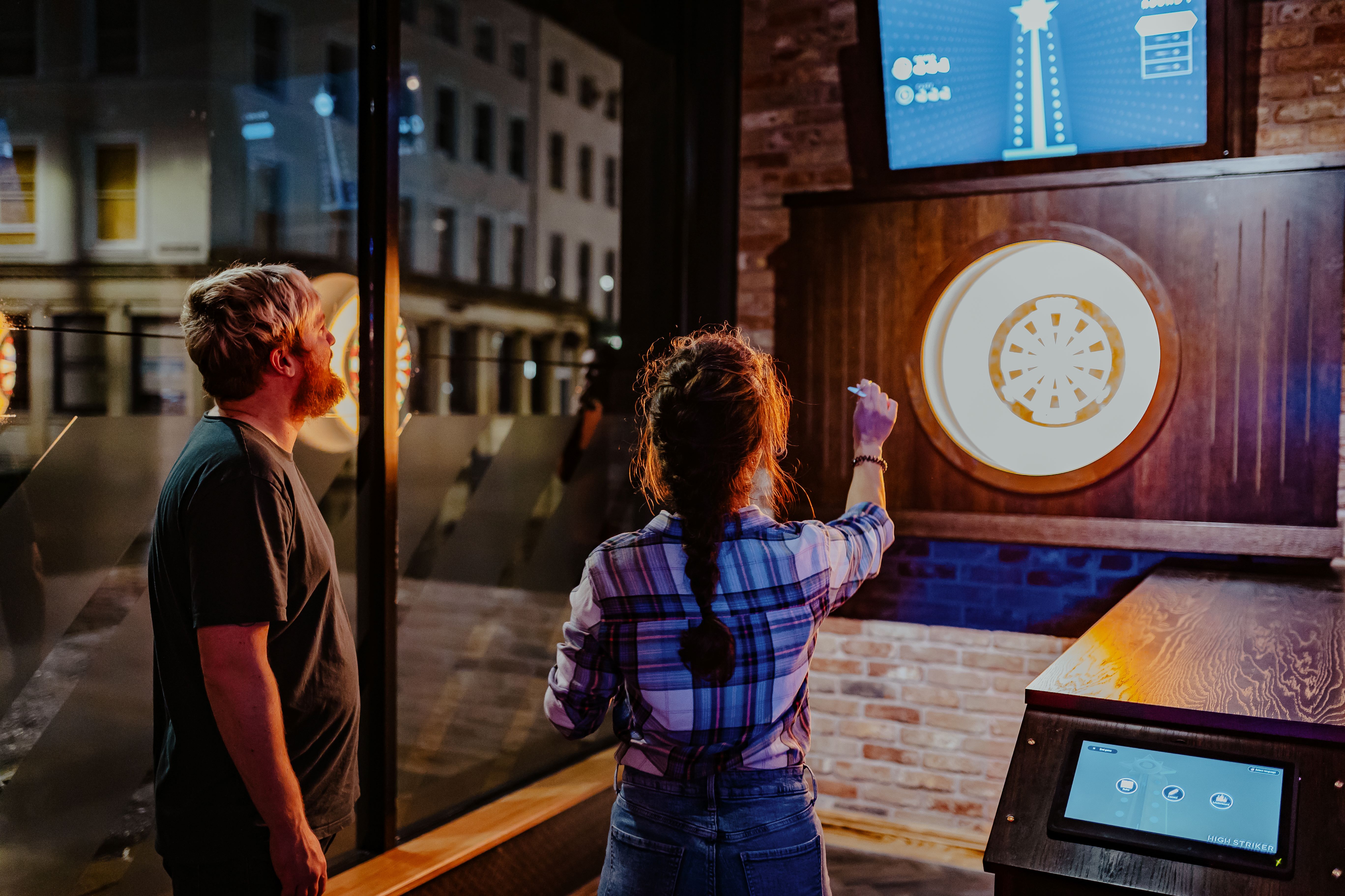 Team-building activity at Bullseye Zone, Roxy Lanes Leeds—interactive event venue with darts.