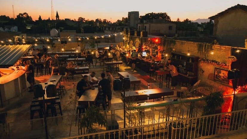 Rooftop venue at 1010 Hall with ambient string lighting for networking events and sunset parties.