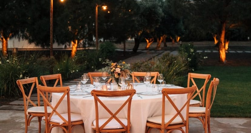 Upscale outdoor wedding venue in Heritage with elegant table settings for evening events.