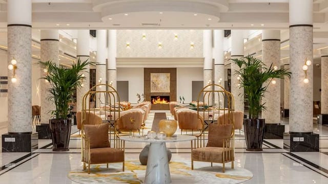 Hilton Nicosia upscale suite lobby for VIP networking and corporate event registration.