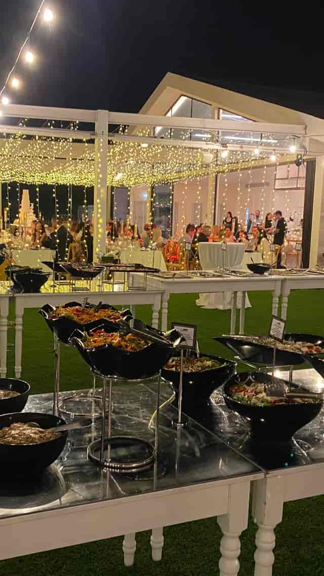Ampeleon restaurant evening banquet with elegant string lighting for corporate events and weddings.