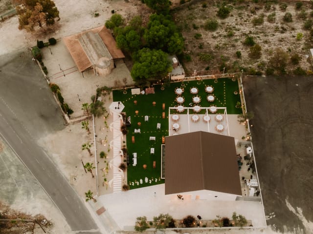 Boutique restaurant in Ampeleon with pergola banquet seating and lawn for wedding events.