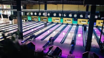 Vibrant bowling alley at King Pins, ideal for corporate events and team-building activities.