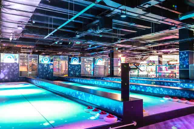 Shuffleboard lanes at The Glide Zone, West Orchard: perfect for team building and corporate events.