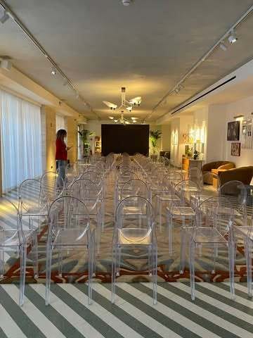 San Lorenzo Studio at Soho House Rome: versatile event space with transparent chairs.